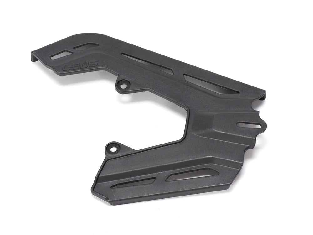 Stomp Ebox chain guard, black metal component with mounting holes, displayed on a white background.