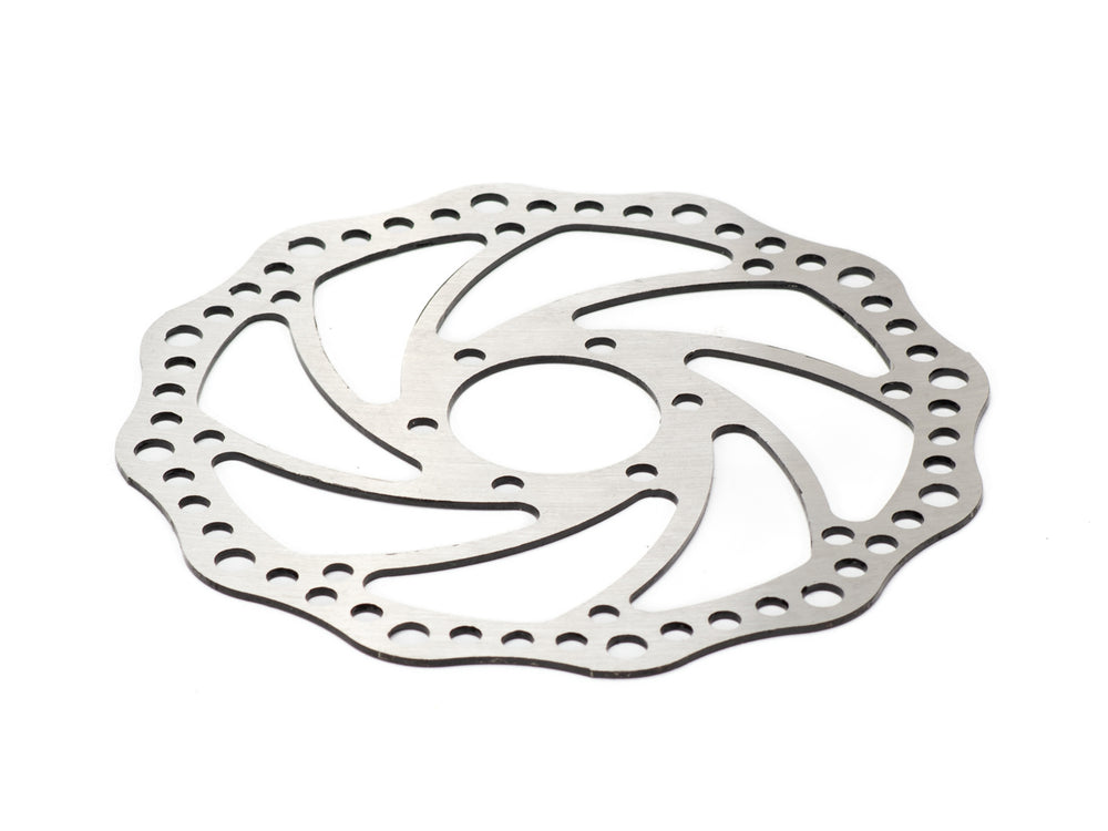 Stomp Ebox Dragster brake rotor, circular metal disc with drilled holes, shown on a white background.