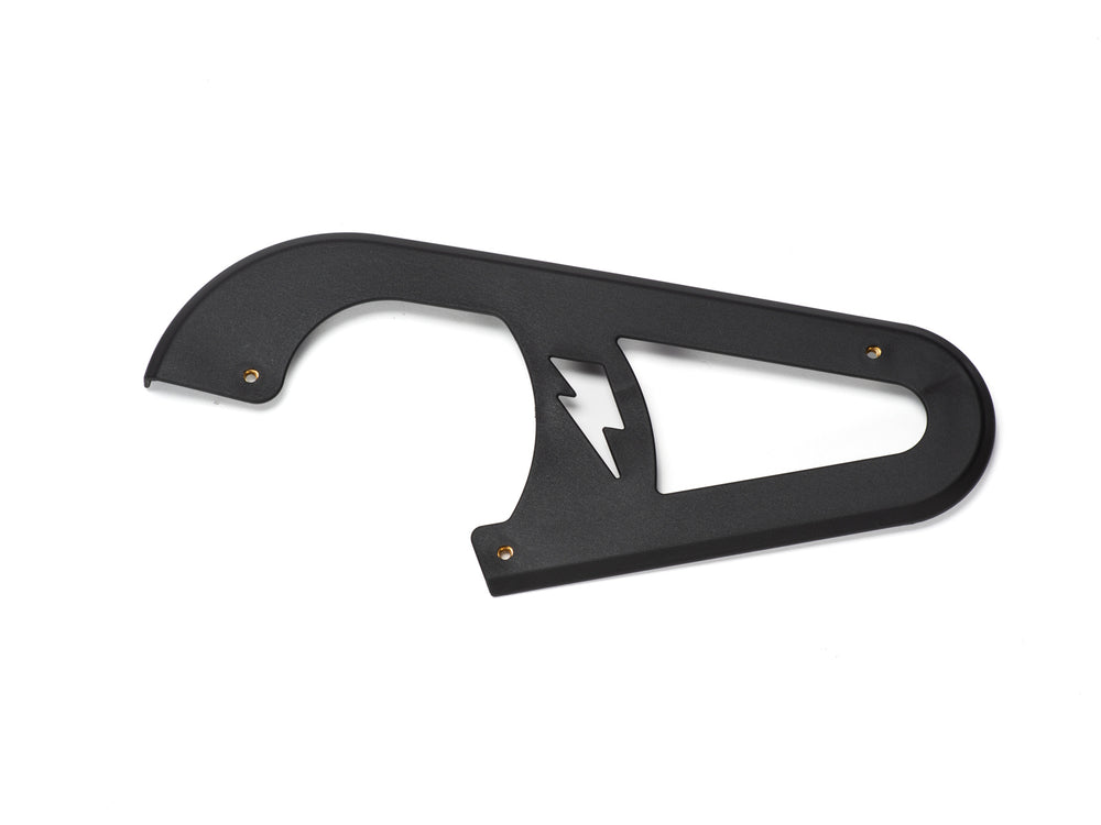 Stomp Ebox Dragster chain guard, black metal component with mounting holes, shown on a white background.
