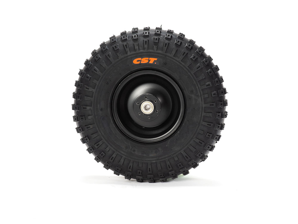 Front view of a Stomp Ebox Dragster front wheel with mounted tire, showing tread pattern and rim design.