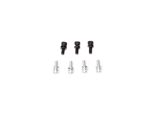 Stomp Ebox Dragster Motor Mounting Kit components arranged on a white background, including metal brackets, bolts, and mounting hardware.