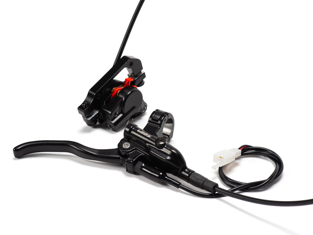 Front view of the Stomp Ebox complete front brake system, showing the brake lever, master cylinder, hose, and caliper components arranged together on a white background.