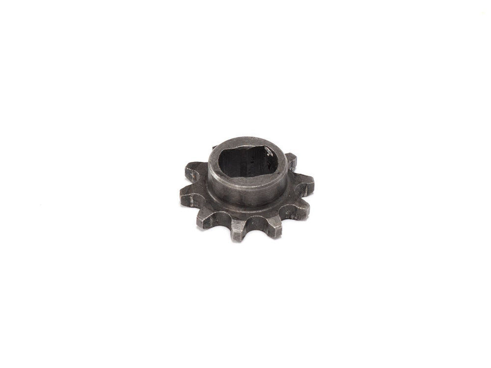 Front view of a Stomp Ebox motorcycle front sprocket, showing metal teeth and central mounting holes against a plain background.