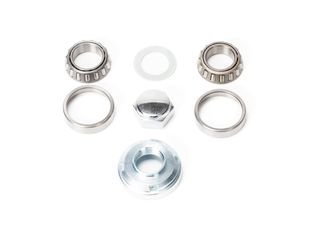 Stomp Ebox Headset Kit components displayed on a white background, including headset bearings, spacers, and top cap.