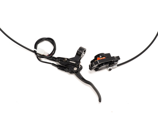 Stomp Ebox rear brake complete system showing brake caliper, disc, master cylinder, and connecting brake line on a white background.