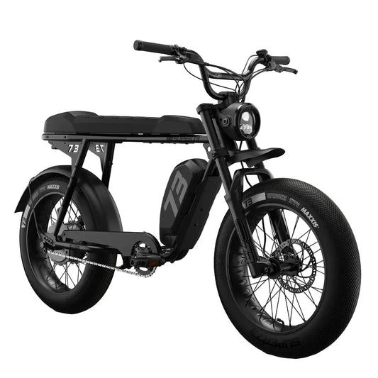 Side view of a Super73 S2 SE eMOTO eBike in a showroom, highlighting its sleek frame, thick tires, and modern design; labeled as in-store pickup only.