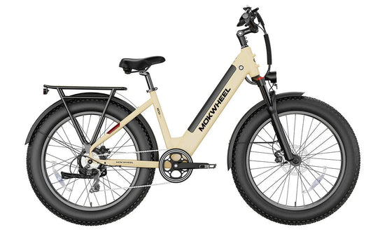 Tan MOKWHEEL Mesa Plus ST 750W step-thru electric bike with 26x4 fat tires, beach cruiser style, shown in product image.