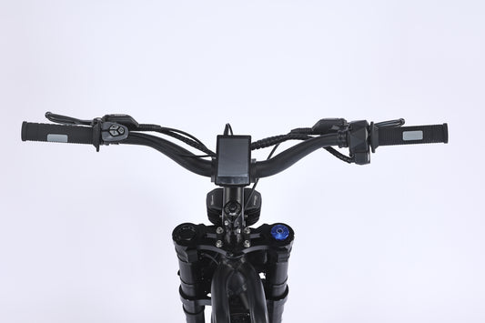 A black eBike Ghostcat F4X Hunter displayed from a side angle, showcasing its rugged frame, thick tires, and integrated battery against a plain background.