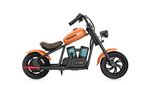 Orange eMOTO Hyper Gogo Challenger 12 Plus electric bike without training wheels, side view on white background